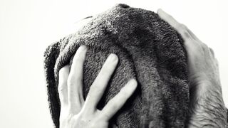 Notes on Being a Man - man wiping face with a towel | Trending HD Video