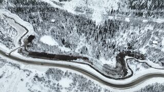 The Pioneer Woman - drone video of a road in a snowy landscape | Trending HD Video