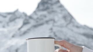 Travelpro - female hand holding white tin mug | Trending HD Video
