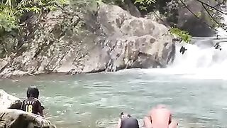 The excitement of swimming in a beautiful waterfall