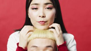 Funny Gift Ideas - young couple posing looking at camera | Trending HD Video