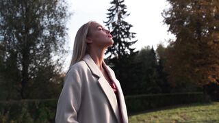 The Shy Snow Woman and the Cursed Ring - woman with closed eyes in a park | Trending HD Video