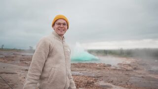 Travel Backpack - excited tourist at geysir in iceland | Trending HD Video