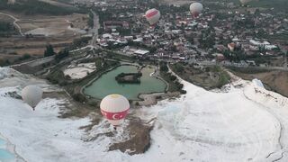 Travel Backpack - aerial view of pamukkale hot springs at dawn | Trending HD Video
