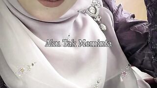 Elegance in Hijab: A Moment of Reflection