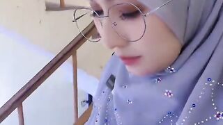 Elegant in Hijab: A Moment of Serenity