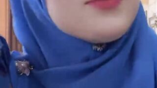 Unveiling Elegance: A Stunning Blue Hijab Moment