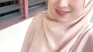 Unveiling Elegance: A Stunning Hijab Style 2