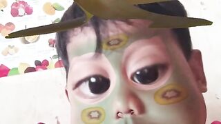 Cute Baby with Funny Face Paint and a Bird on Head!
