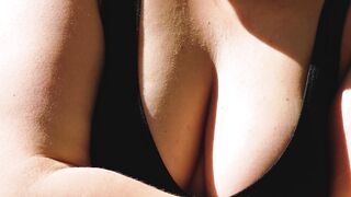 Wonder Woman - a curvy model in black top posing for camera | Trending HD Video