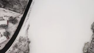 Winter Coat - aerial footage of a snowcapped village | Trending HD Video