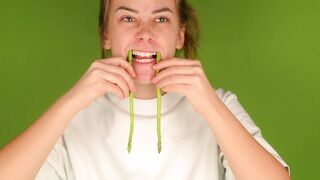 Woman - woman playing with stalks of asparagus | Trending HD Video