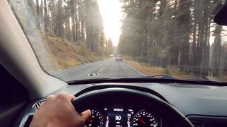 Travel Backpack - point of view of a car driving along the road | Trending HD Video