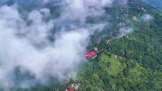 পাহাড়ের উপর মেঘে ডাকা সাজেকের ভিউ