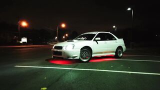 Electric car - video of a subaru with red neon lights | Trending HD Video 2