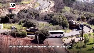 Israeli tanks move to Lebanon border as Israel strikes the country