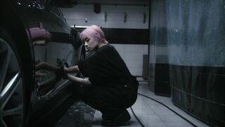 Woman Within - a young woman cleaning a car | Trending HD Video