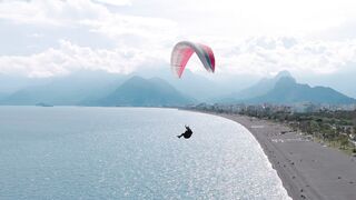 Wallpaper removal - a man paragliding | Trending HD Video