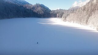 I Love Wallpaper - aerial view of serene snowy alpine lake | Trending HD Video