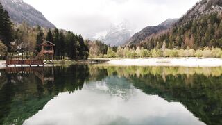 WallPics - 4K Wallpapers - tranquil mountain lake with reflective waters | Trending HD Video
