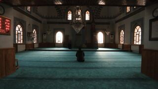 Notes on Being a Man - a man sits in the middle of a mosque | Trending HD Video