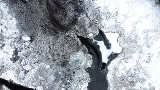 Moving Backgrounds 4k - WALLPS - aerial view of icy river and snowy landscape | Trending HD Vid