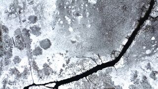 Silly Smile Live Wallpaper 4K - aerial view of icy landscape with cracks | Trending HD Video