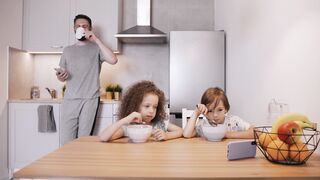 Funnyfuzzy - kids eating breakfast while watching on the phone | Trending HD Video