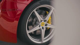 Cartier - luxury red ferrari driving through city streets | Trending HD Video