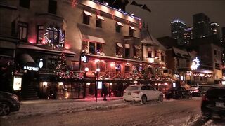 Winter Coat - buildings with christmas lights and decorations | Trending HD Video