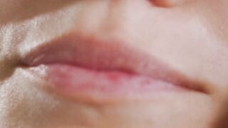 Funnyfuzzy - close up video of a woman touching her face | Trending HD Video