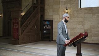 Notes on Being a Man - a man reading a prayer from quran | Trending HD Video