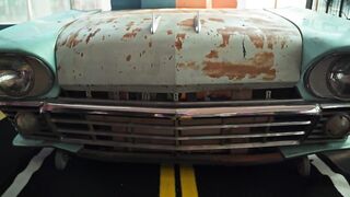 Electric car - rusty car hood in apartment | Trending HD Video