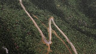 WallPics - 4K Wallpapers - aerial view of winding mountain road | Trending HD Video