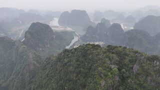 Silly Smile Live Wallpaper 4K - aerial view of ninh binh s misty mountainscape | Trending HD Vi