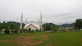 The Wedding People A Novel - time lapse of people visiting the faisal mosque on a cloudy day |