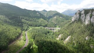 Wallpaper hanging - breathtaking aerial view of austrian mountain viaduct | Trending HD Video