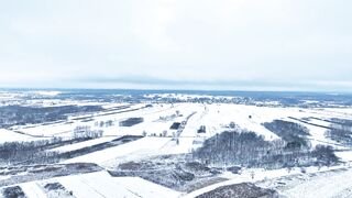 Winter Coat - aerial view of snow covered fields in winter | Trending HD Video