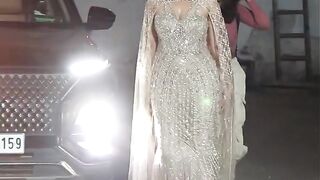 Ayesha Khan stuns in a glittering shiny outfit, twirls to flaunt her outfit