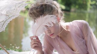 The Bold and the Beautiful - woman in marie antoinette stylization playing with feather | Trend