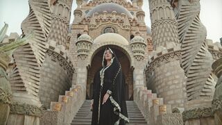 The Pioneer Woman - a woman standing in a facade of the palce | Trending HD Video