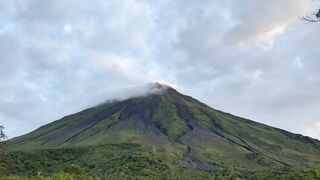 Travel Backpack - a mountain with a cloud on top of it | Trending HD Video