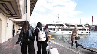 Travelon - travelers walk near ferry in istanbul port | Trending HD Video
