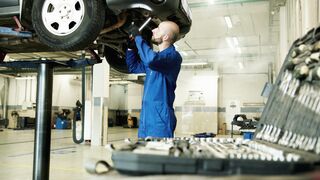 Scarred - a mechanic looking repairing a car | Trending HD Video