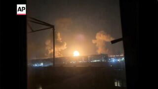 Parts of Tehran covered in smoke after strikes hit Iran oil depot and refinery 2