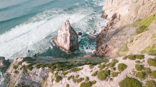 Silly Smile Live Wallpaper 4K - coastal landmark by the cliffs and atlantic ocean in sintra por