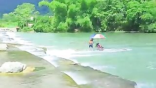 enjoy a leisurely boat trip along Yulong River