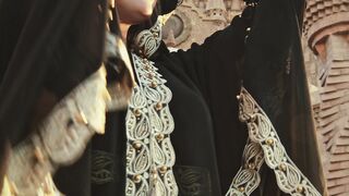 Woman Within - a woman in hijab dancing in front of a palace | Trending HD Video