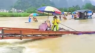 enjoy a leisurely boat trip along Yulong River 2