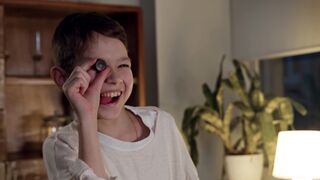 Funnyfuzzy - boy holding small hockey puck and making funny face | Trending HD Video